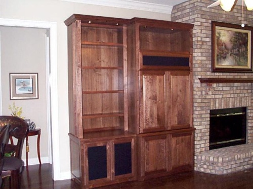 Notice the columns and lights in front of the bookcase.  The lights "waah" the front of the bookcase with this technique.