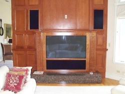 The old fireplace was rebuilt to house a plazma TV and associated equipment