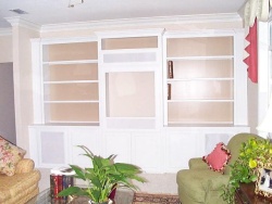 The backs of the bookcases are painted in an accent color