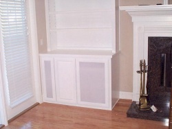 The left hand cabinet houses the equipment and left speaker