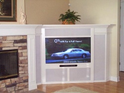 The corner TV unit ties into the existing fireplace