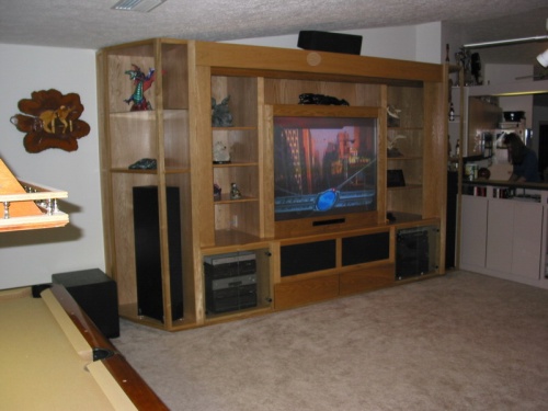 The 62" projection TV is great for daytime viewing.  Drawers at the bottom center are used for media storage.