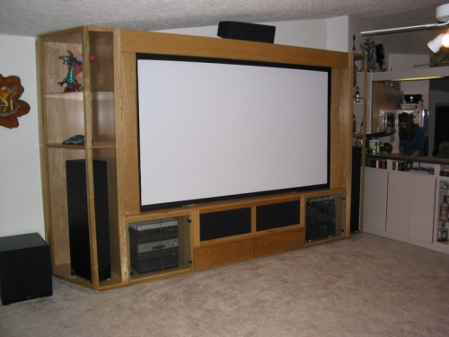 The TV's speakers can be heard through the grill cloth facade at the bottom of the screen.