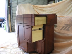 This special drawer will hold curling irons and a blow dryer.