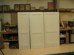 The doors are primed, ready to drill and paint