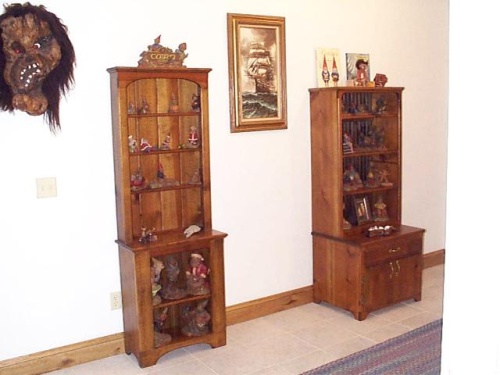 A couple pine display cabinets