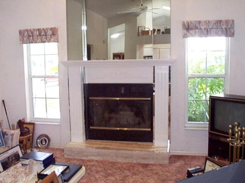 This wood mantel system was added to an existing mirrored fireplace---------------CLICK ON THE PICTURE TO SEE MORE PICTURES WITHIN THIS ALBUM
