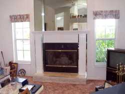 This wood mantel system was added to an existing mirrored fireplace---------------CLICK ON THE PICTURE TO SEE MORE PICTURES WITHIN THIS ALBUM
